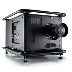 This image shows a high-performance black projector designed for professional use. It features a robust and industrial design with protective framing on the top and bottom. The projector has multiple ventilation grills for efficient cooling and a prominent, high-quality lens at the front for superior image projection. It includes various input/output ports on the side, suitable for advanced connectivity options. The projector is supported by adjustable feet, ensuring stability and proper alignment. The sleek, matte black finish emphasizes its professional and durable build.