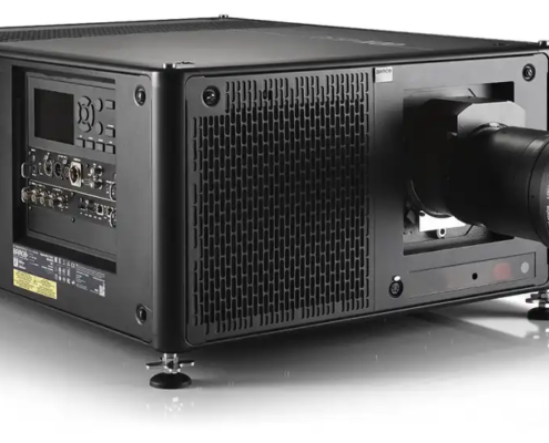 This is a high power black projector for professional use. Industrial design with multiple ventilation grills for cooling. High quality lens at the front. Multiple input/output ports on the side. Adjustable feet for stability and alignment. Perfect for big venues, conferences, theaters, outdoor events where high image quality is required.