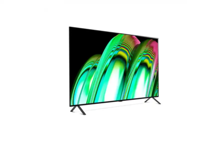 This is a modern, slim 65 Inch UHD Touch Screen Rental with an abstract design in green and pink on a black background. It stands on 2 legs and has super thin bezels around the screen. Perfect for home or office. The colors and image are high definition so great for entertainment, presentations or digital signage.
