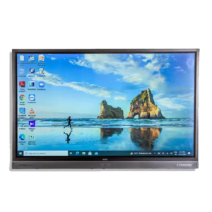 UHD monitor rental showing desktop with beach and rock formations wallpaper. Desktop icons and taskbar open, ready to go in a office or educational environment. Monitor shows off its high definition and clarity, perfect for presentations, video conferencing or interactive displays. Sleek design to fit any workspace.