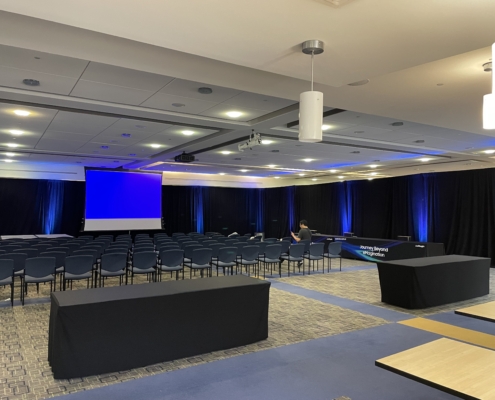 Close-up of a high-quality projector available for event rentals from AVR Expos, providing sharp visuals for meetings and presentations.