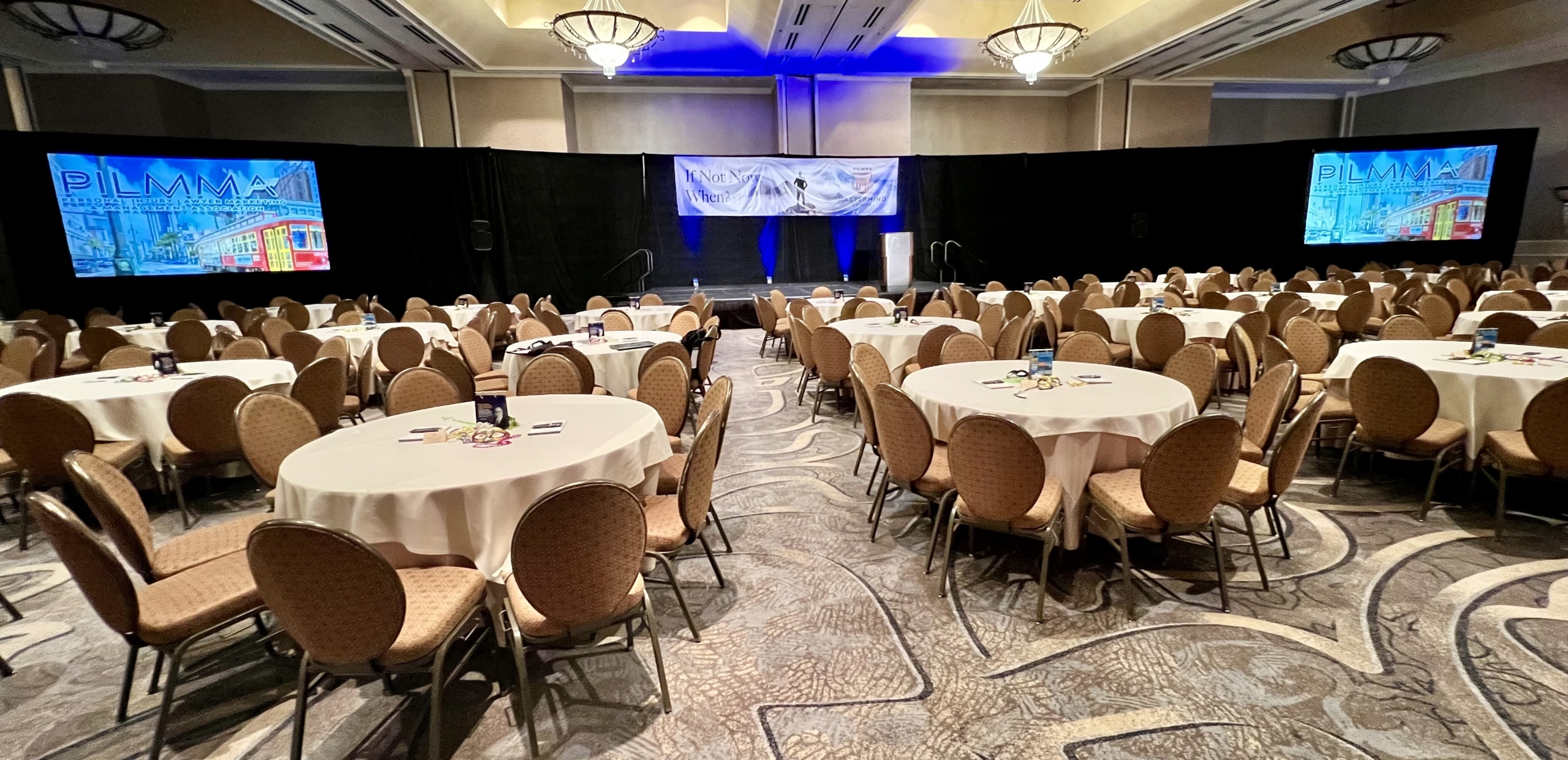 Audio visual rental setup with wireless microphones and projectors at a corporate event in DC