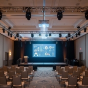 12,000-lumen laser projector with a 9x16 screen in an Orlando hotel ballroom