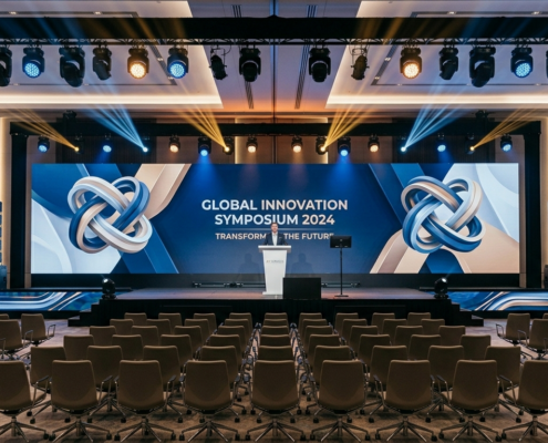 Corporate event stage with LED wall and clean AV setup